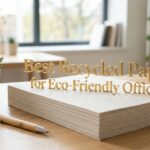 Stack of recycled printer paper on a wooden desk with the title text for eco-friendly offices.